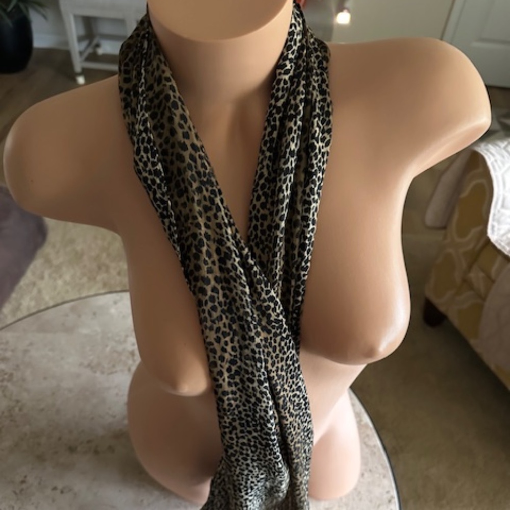 Two animal print silk like scarfs   They look good together - great condition